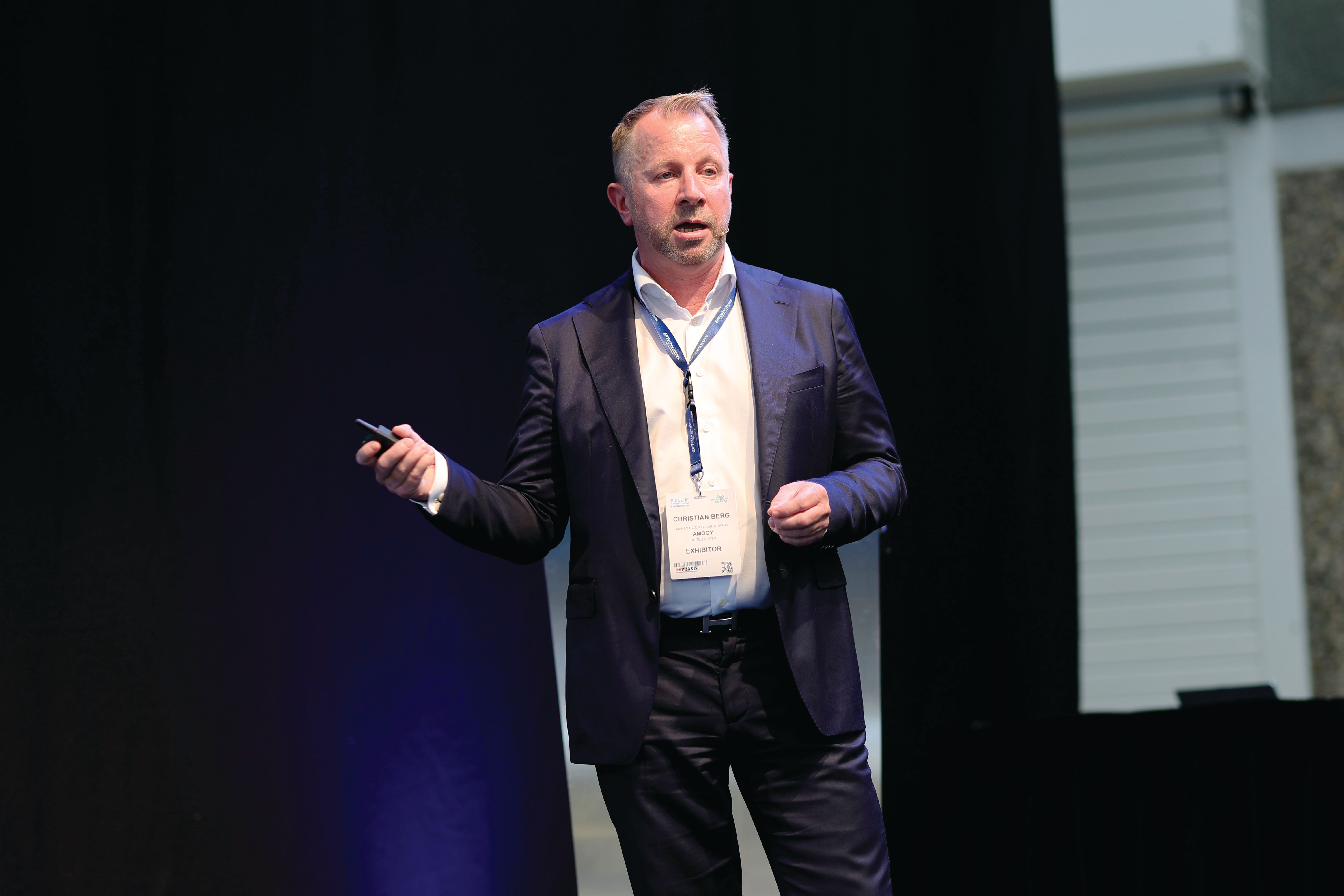 Photo shows a speaker at Electric & Hybrid Marine Conference
