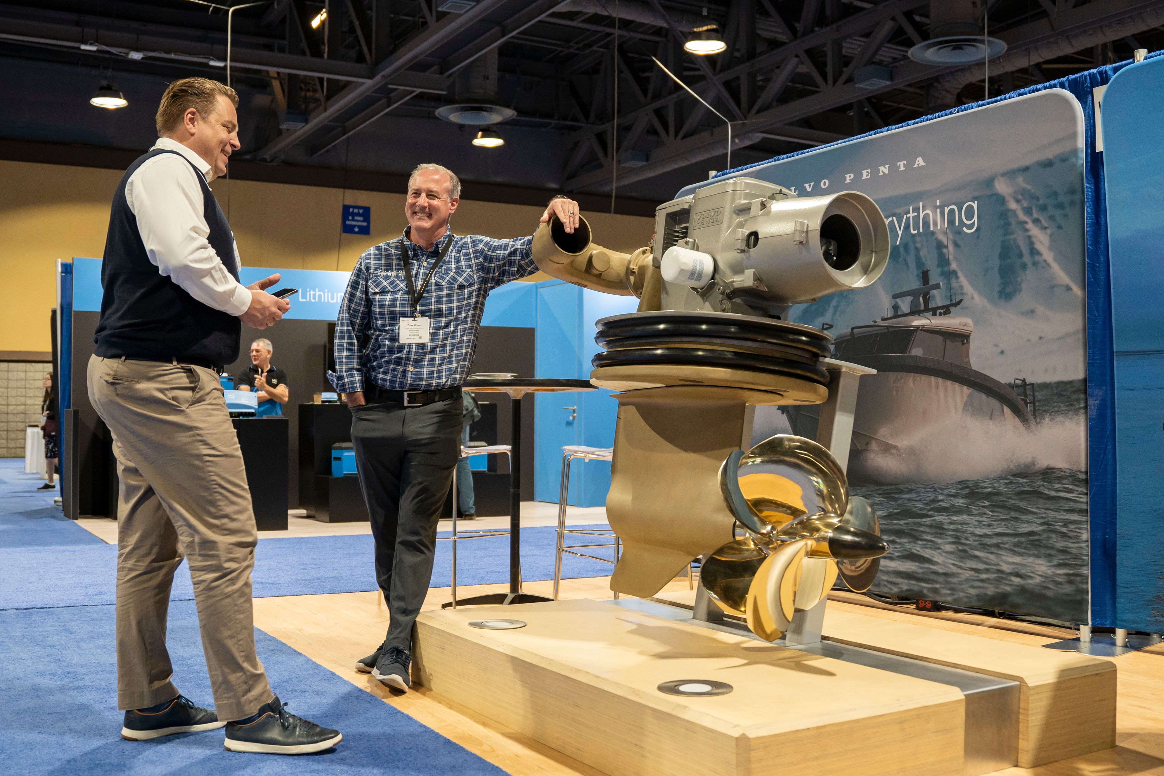 Photo shows an exhibitor showcasing technology at Electric & Hybrid Marine Expo, North America