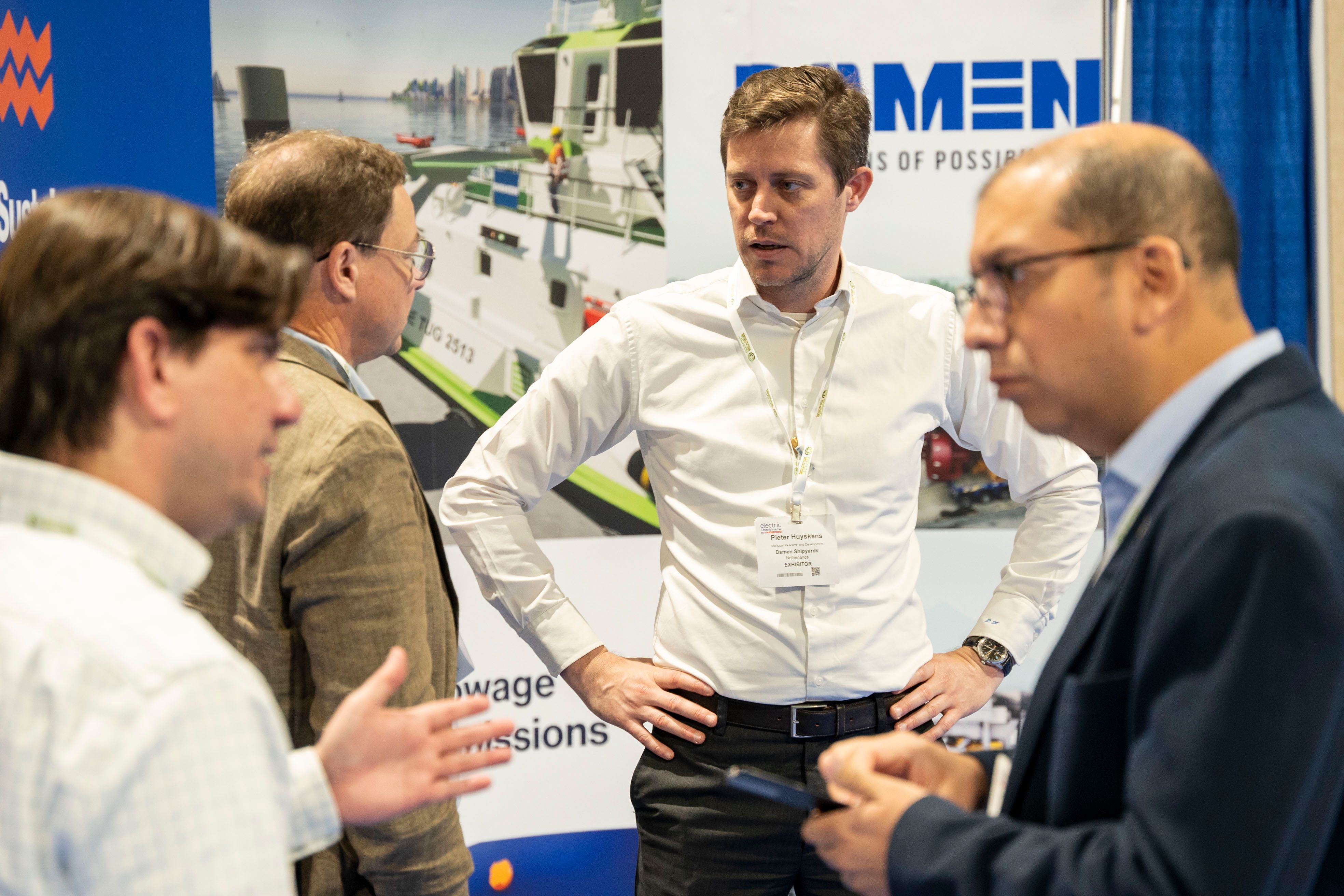 Photo shows attendees networking at Electric & Hybrid Marine Expo in North America