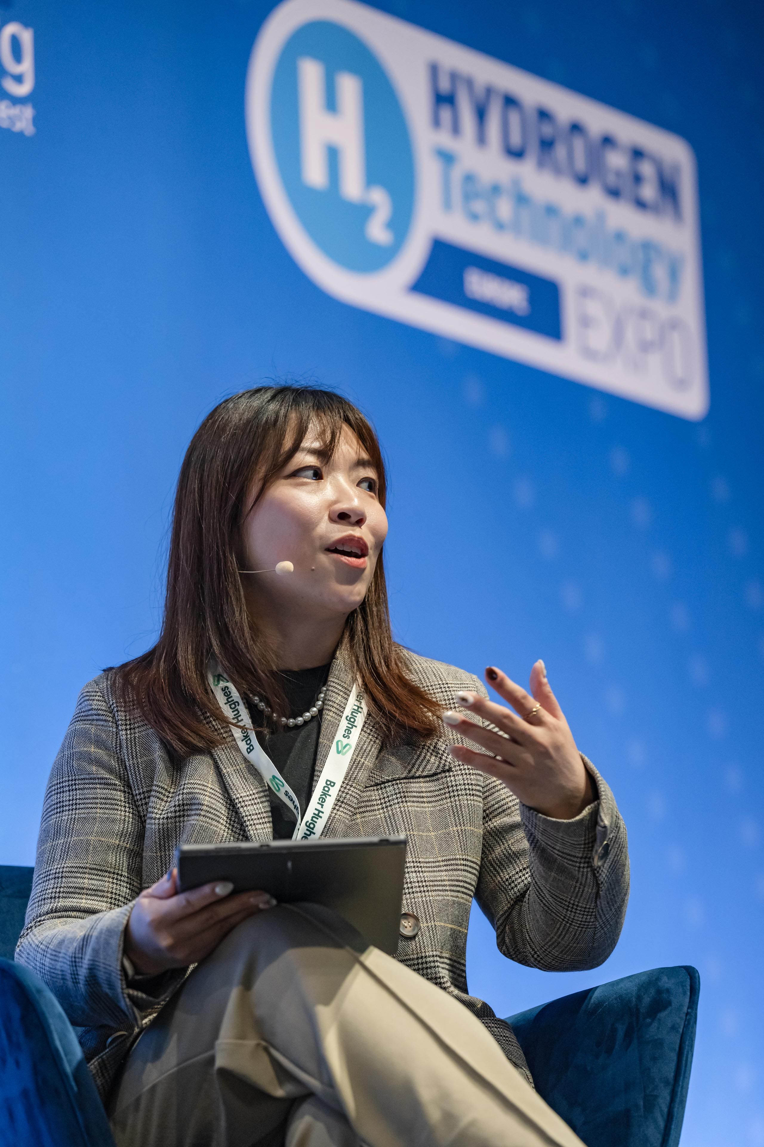 A close up image of a female speaker on the Hydrogen Technology Expo Conference stage 