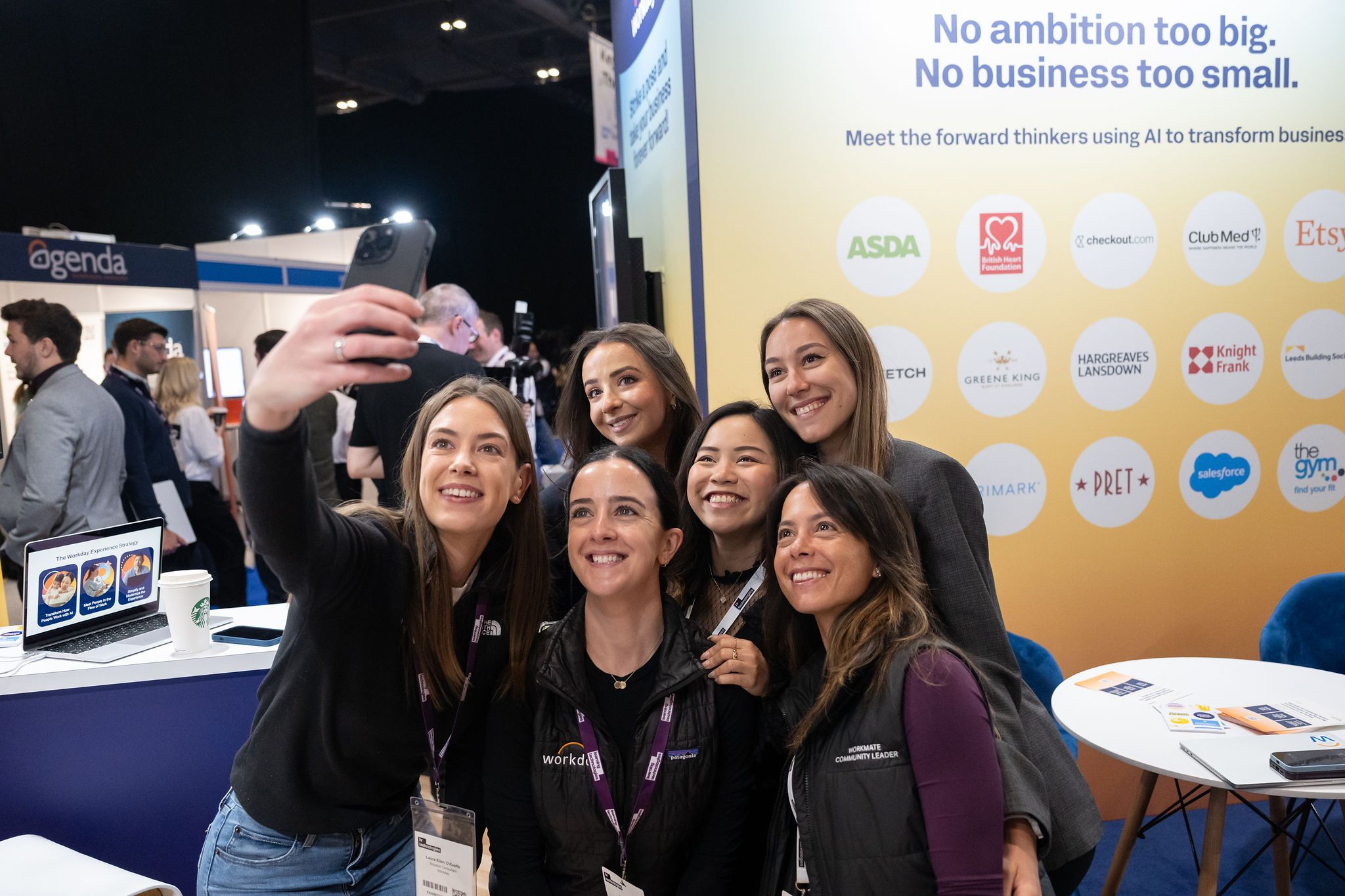 A group of exhibitors taking a selfie at HR Technologies UK