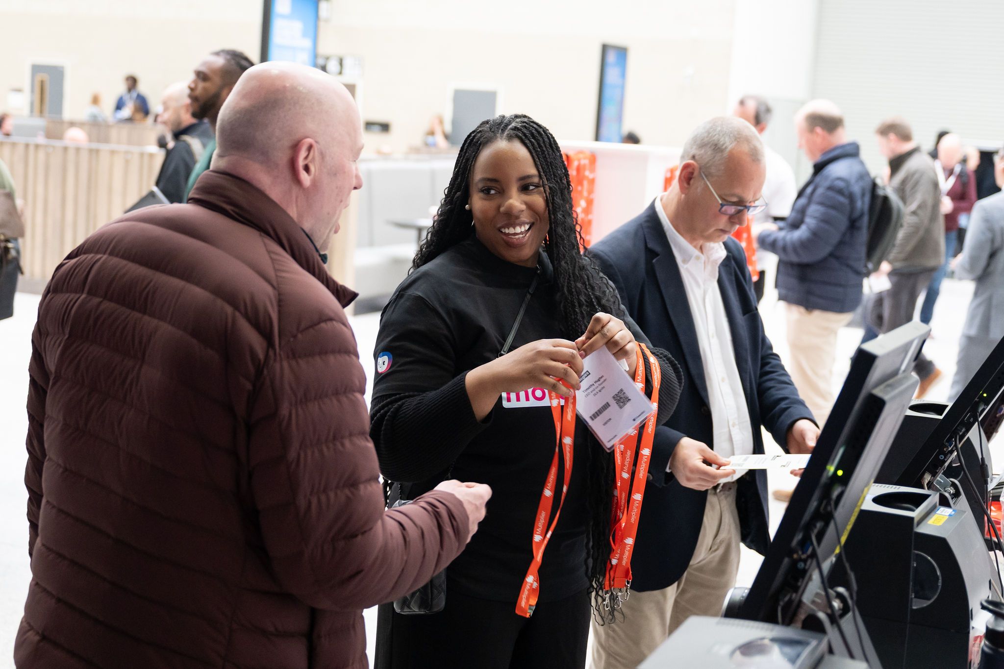 A visitor having their badge scanned on entry to HR Technologies UK