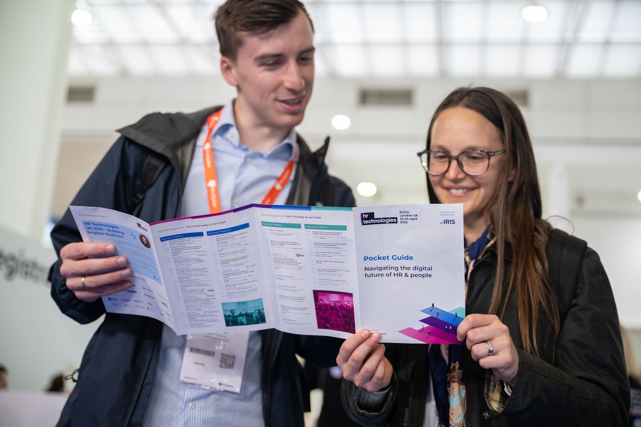 Visitors looking at the floorplan of HR Technologies UK