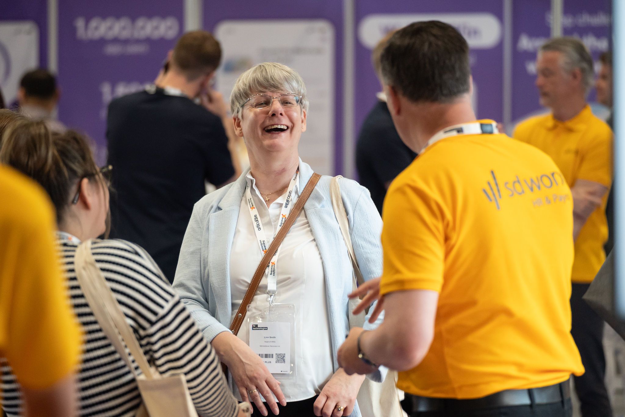 Visitors at HR Technologies UK networking with eachother