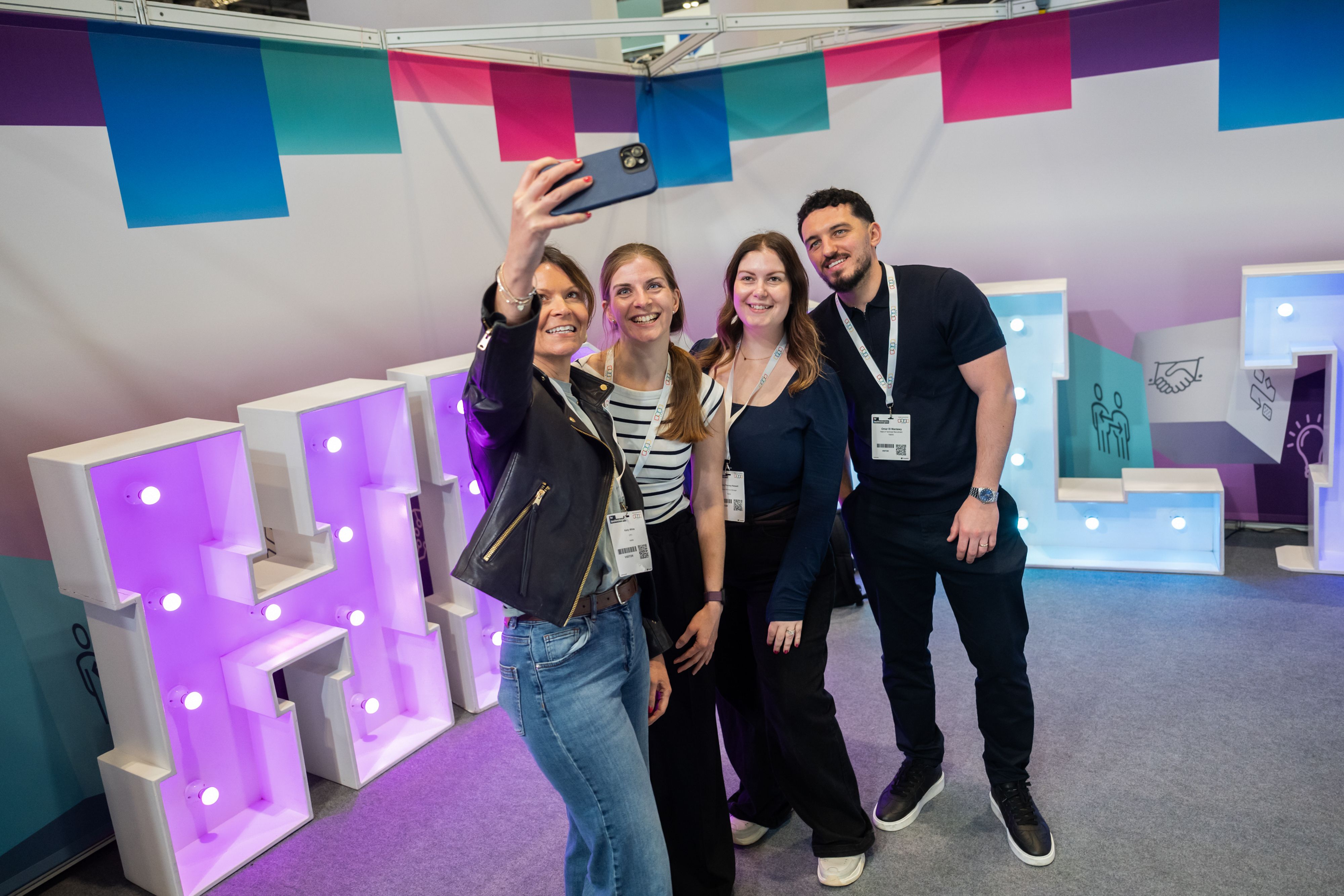 Visitors at HR Technologies UK networking with eachother