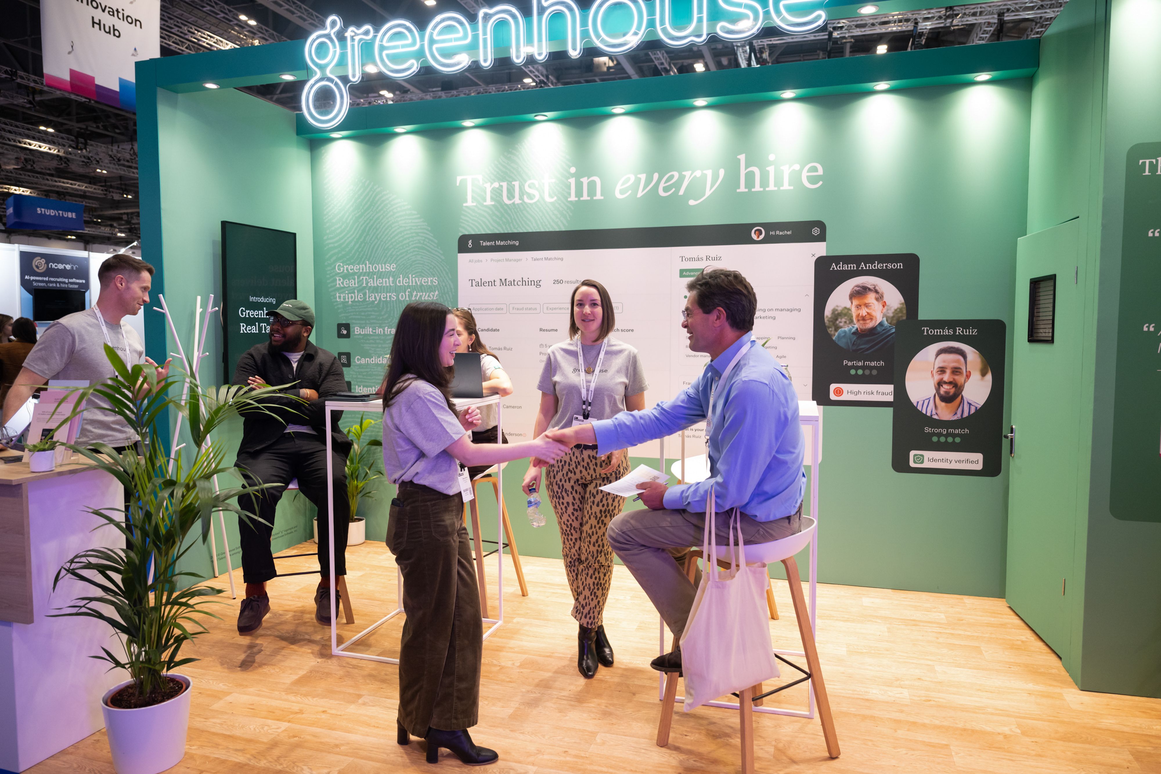 A group of people stood on an exhibitors stand at HR Technologies UK
