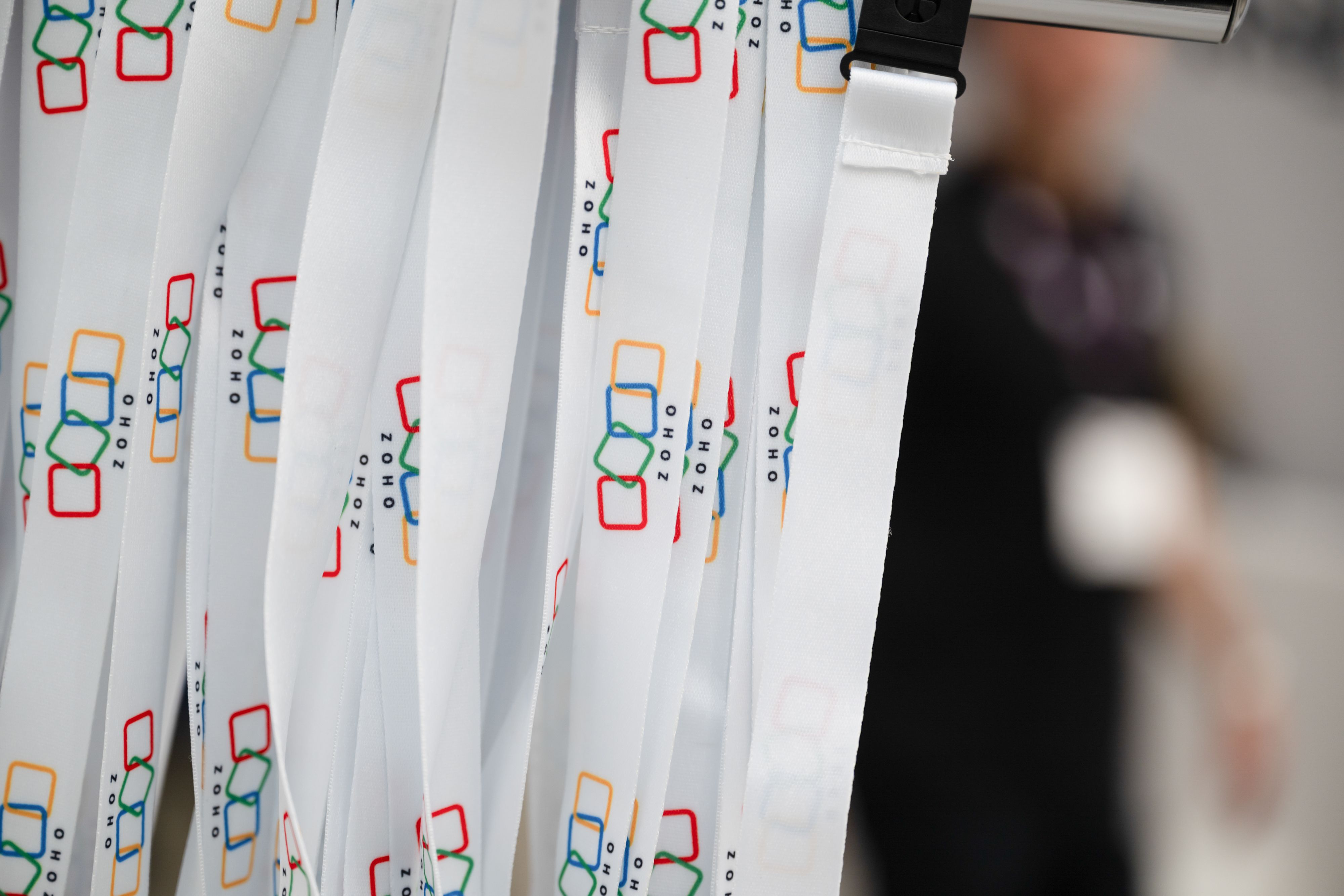 Sponsored lanyards hanging in the entrance to HR Technologies UK