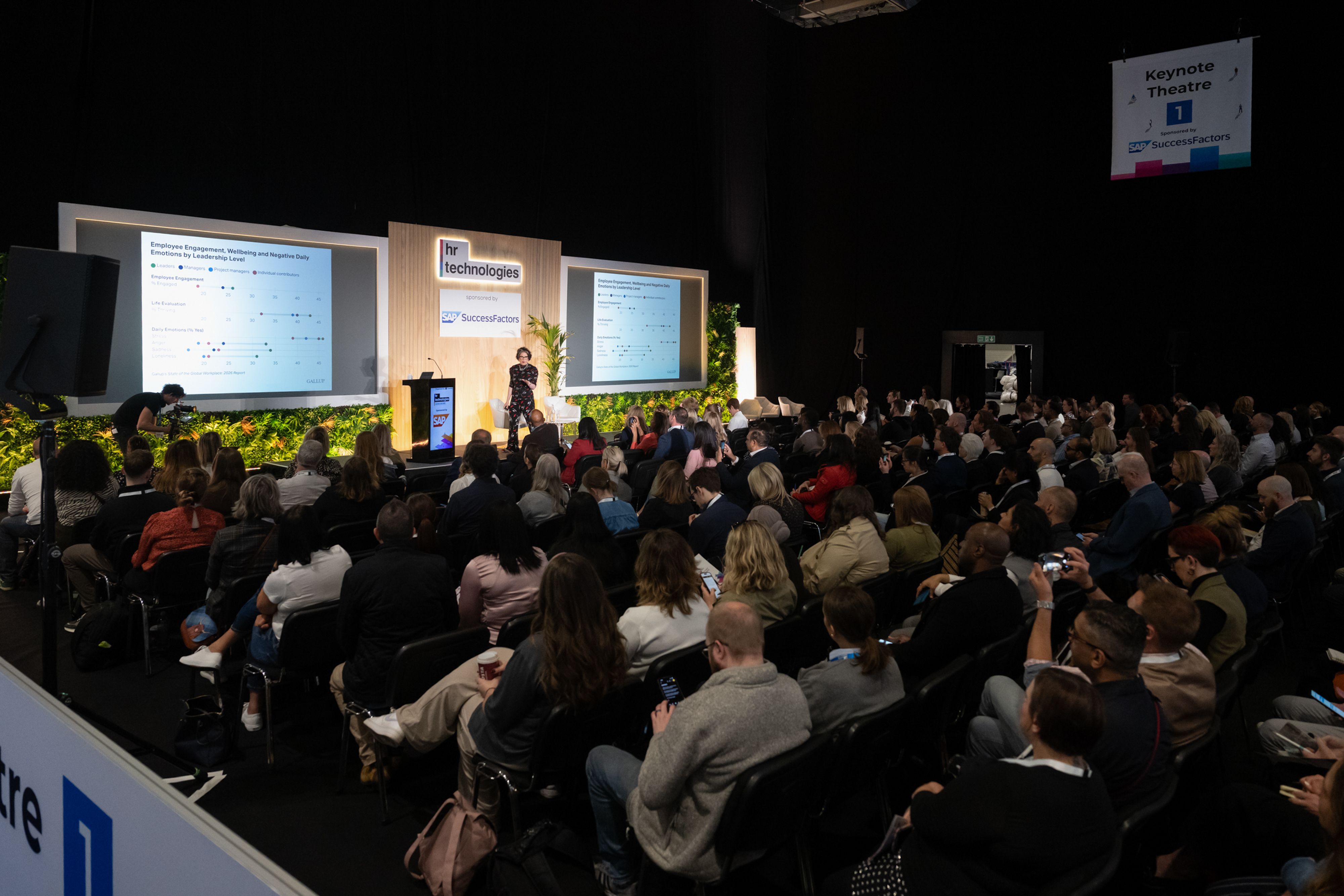 A crowd watching a keynote session from HR Technologies UK