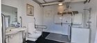 Temporary Adaptive Wet Room Extension