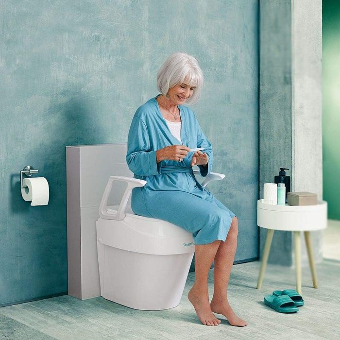 Dietz SmartFix Raised Toilet Seat with Adjustable Height and Armrests