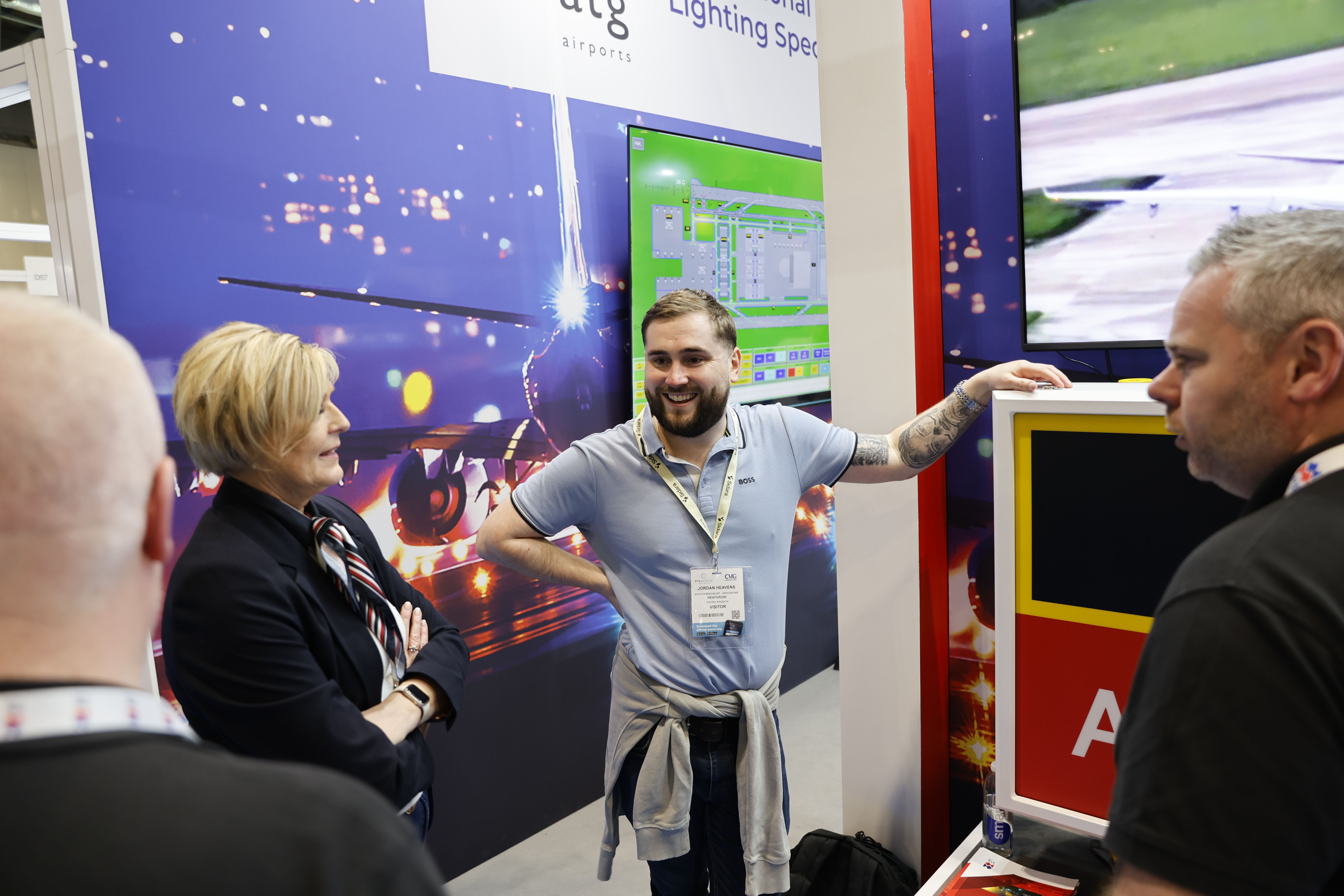 An exhibitor and visitor at PTE World