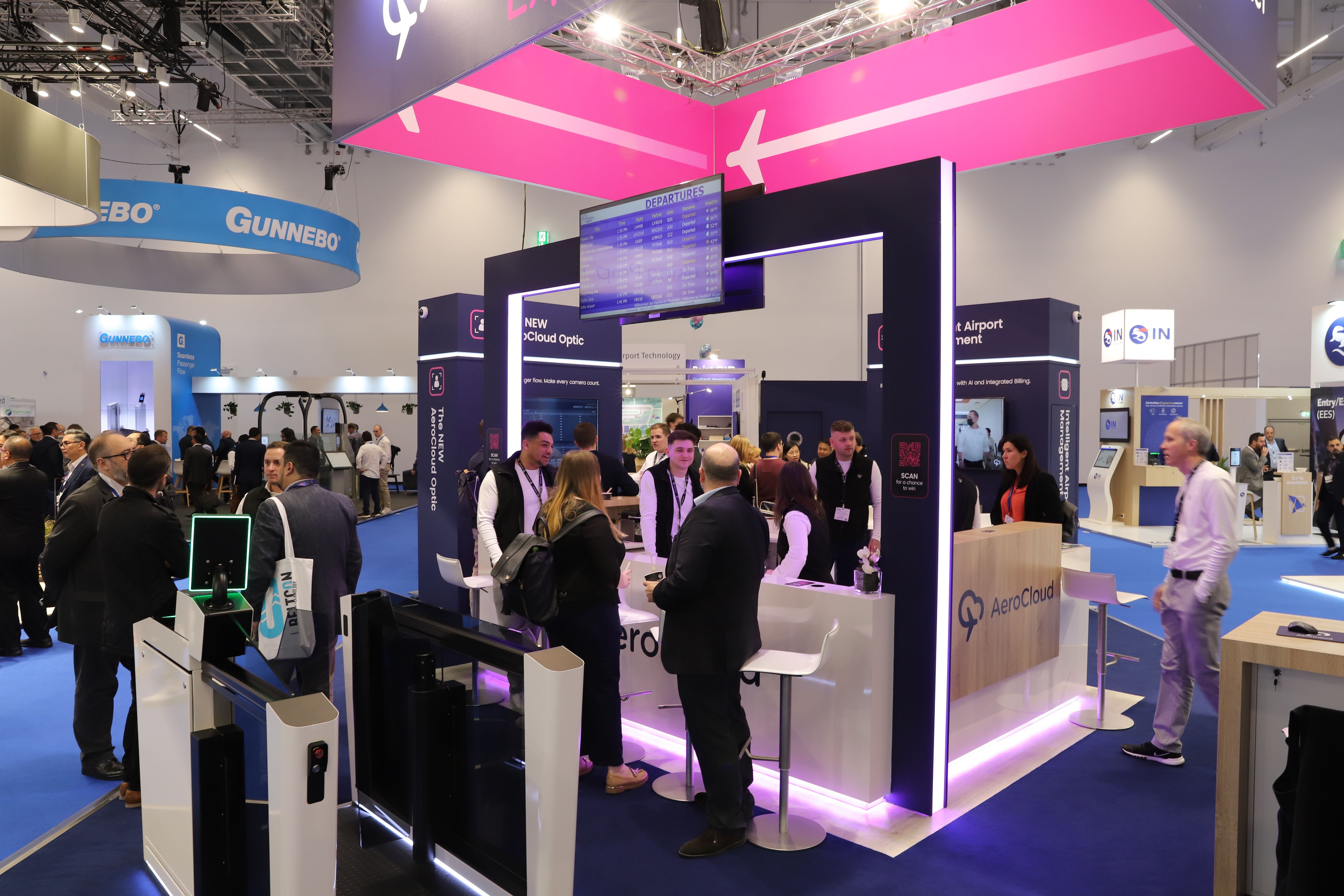 Photo shows a visitor getting a product demo at PTE World
