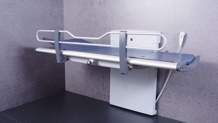 SCT 3000 shower change table, electrically height adjustable
