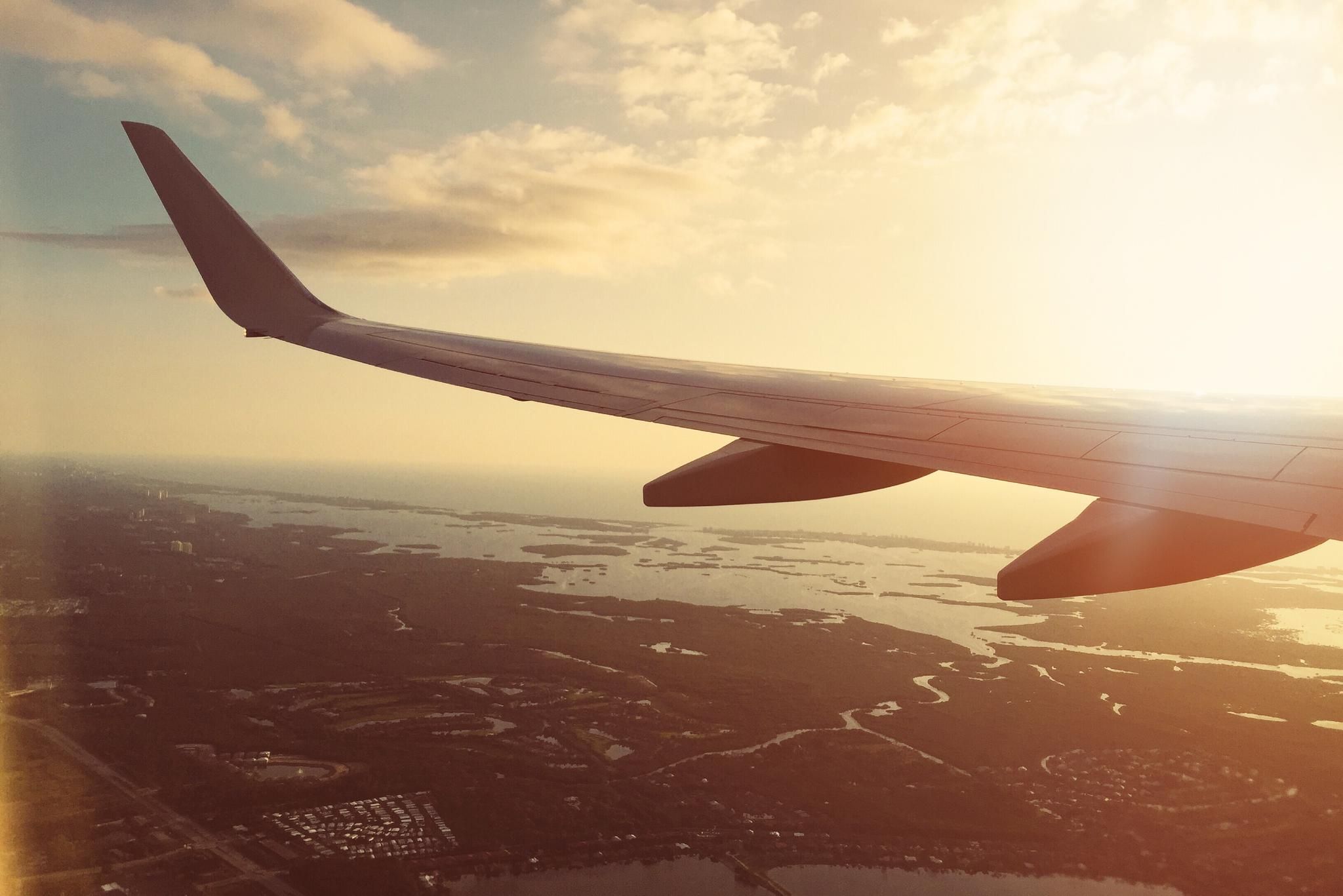 BY PLANE