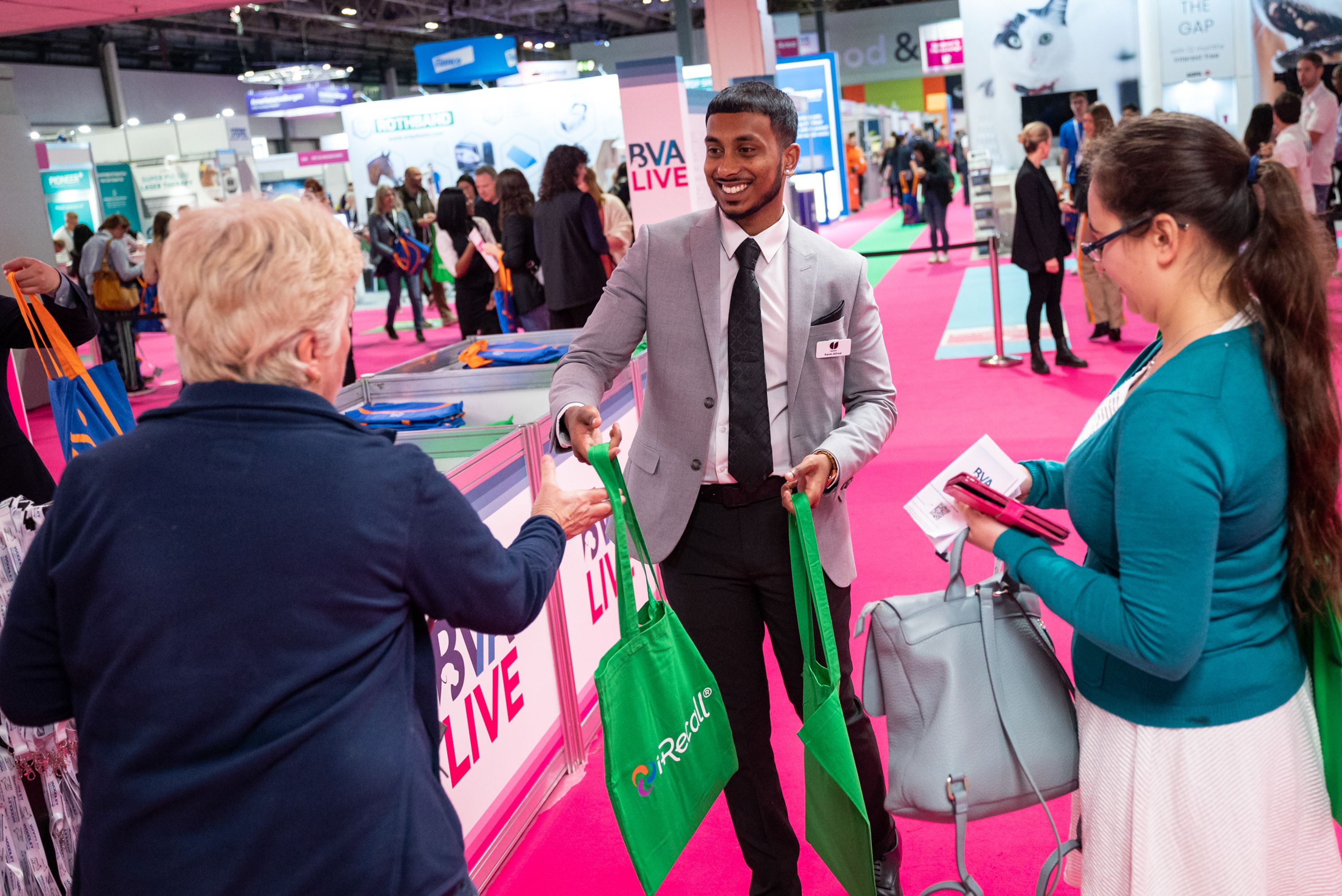 Delegates receiving a bag on arrival