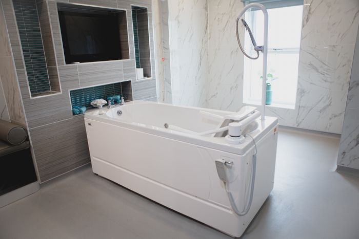 Height Adjustable Assisted Bath