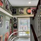 Bespoke films and music timeline mural design in care home hallway