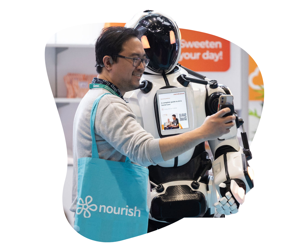 Man and robot at Care Show London