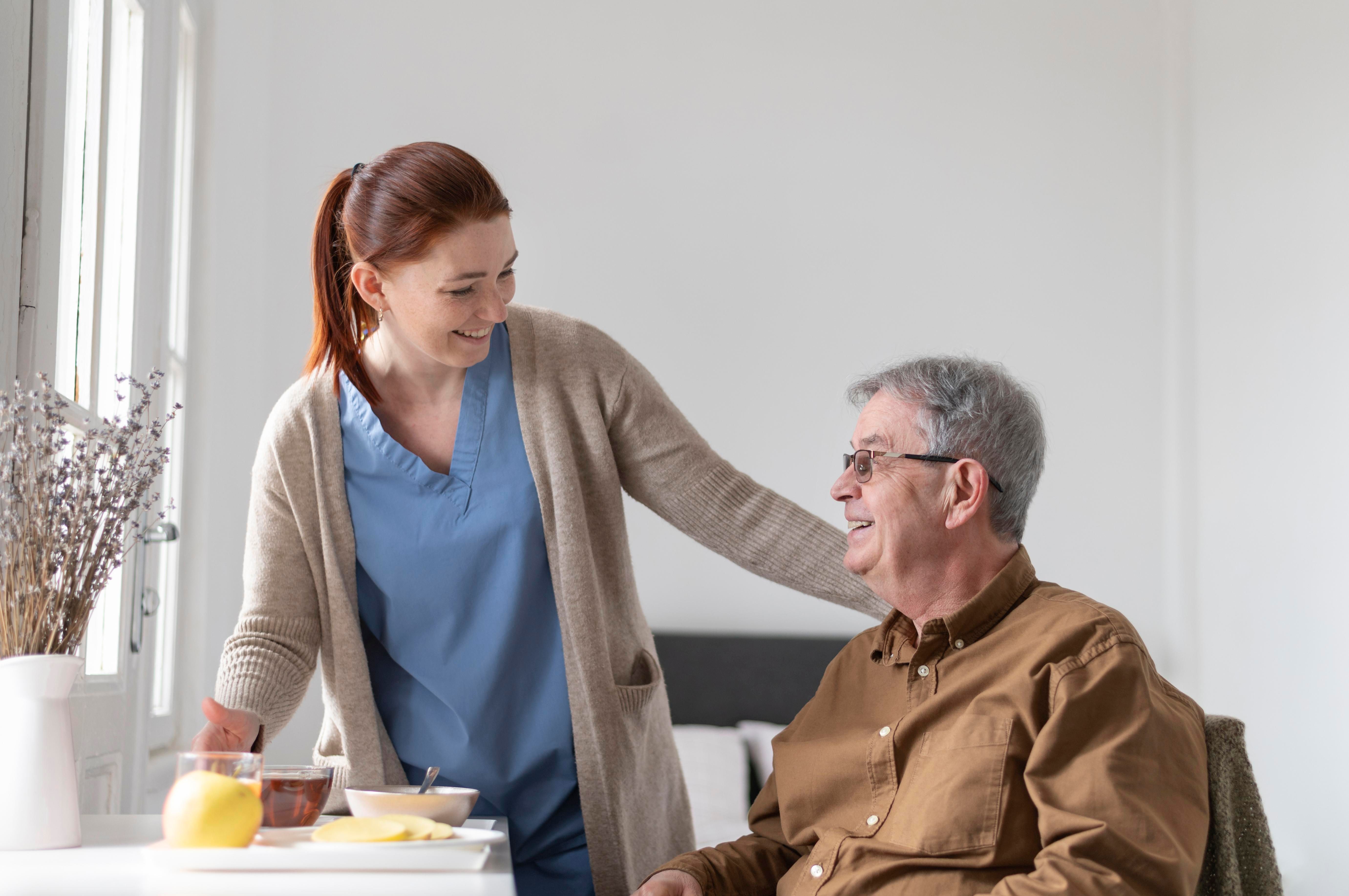  A Care Assistant preparing breakfast for an individual.