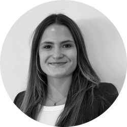 Black and white headshot of a woman with brown hair