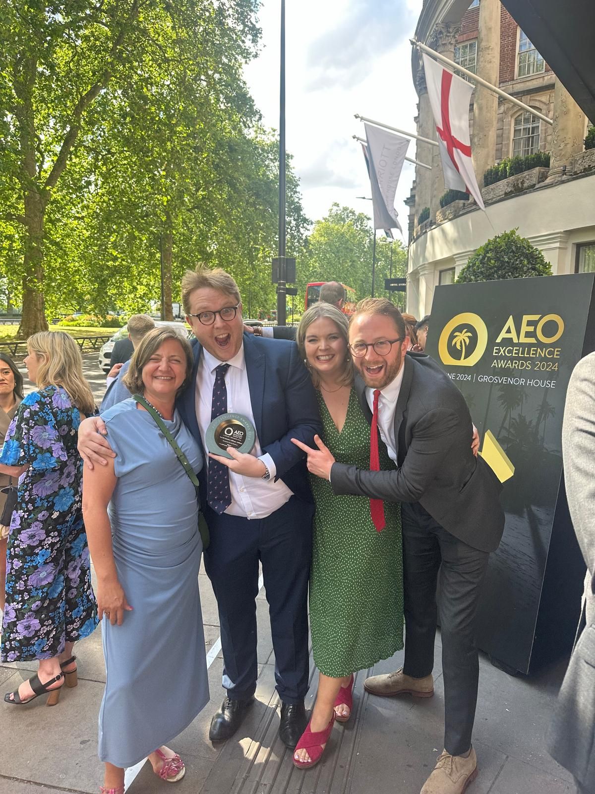 Lotty and the team winning their AEO Award
