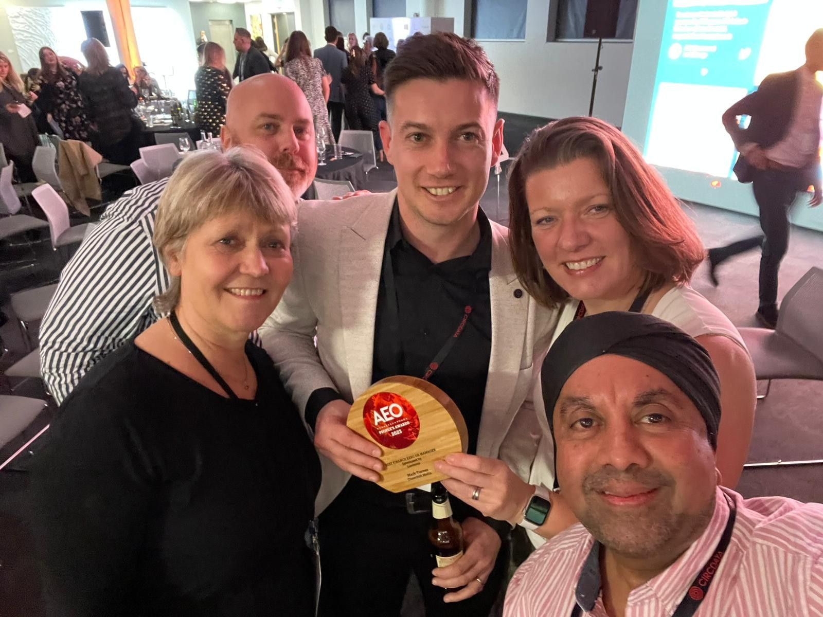 Sam and her team winning an AEO Award