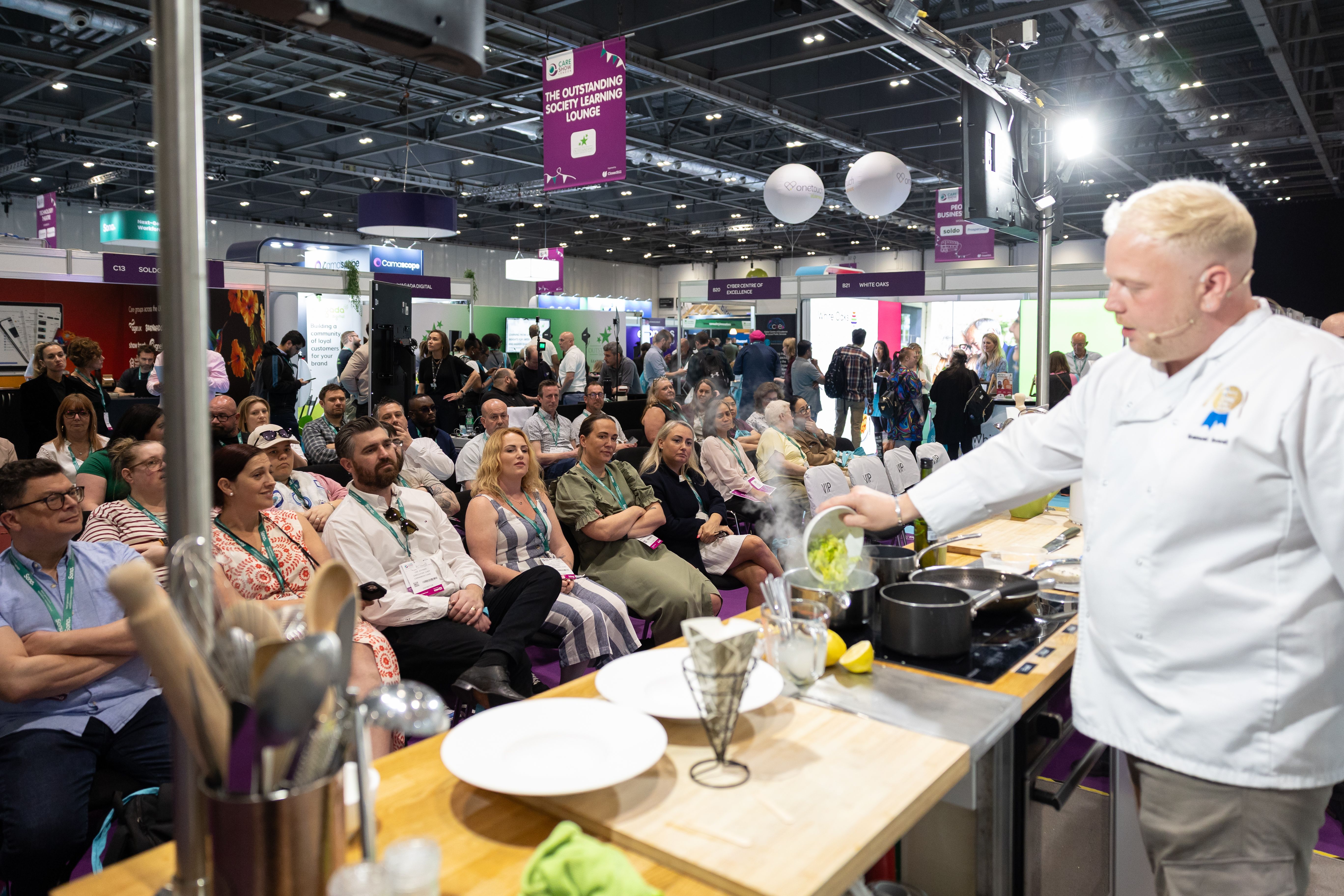 Man cooking in the catering theatre