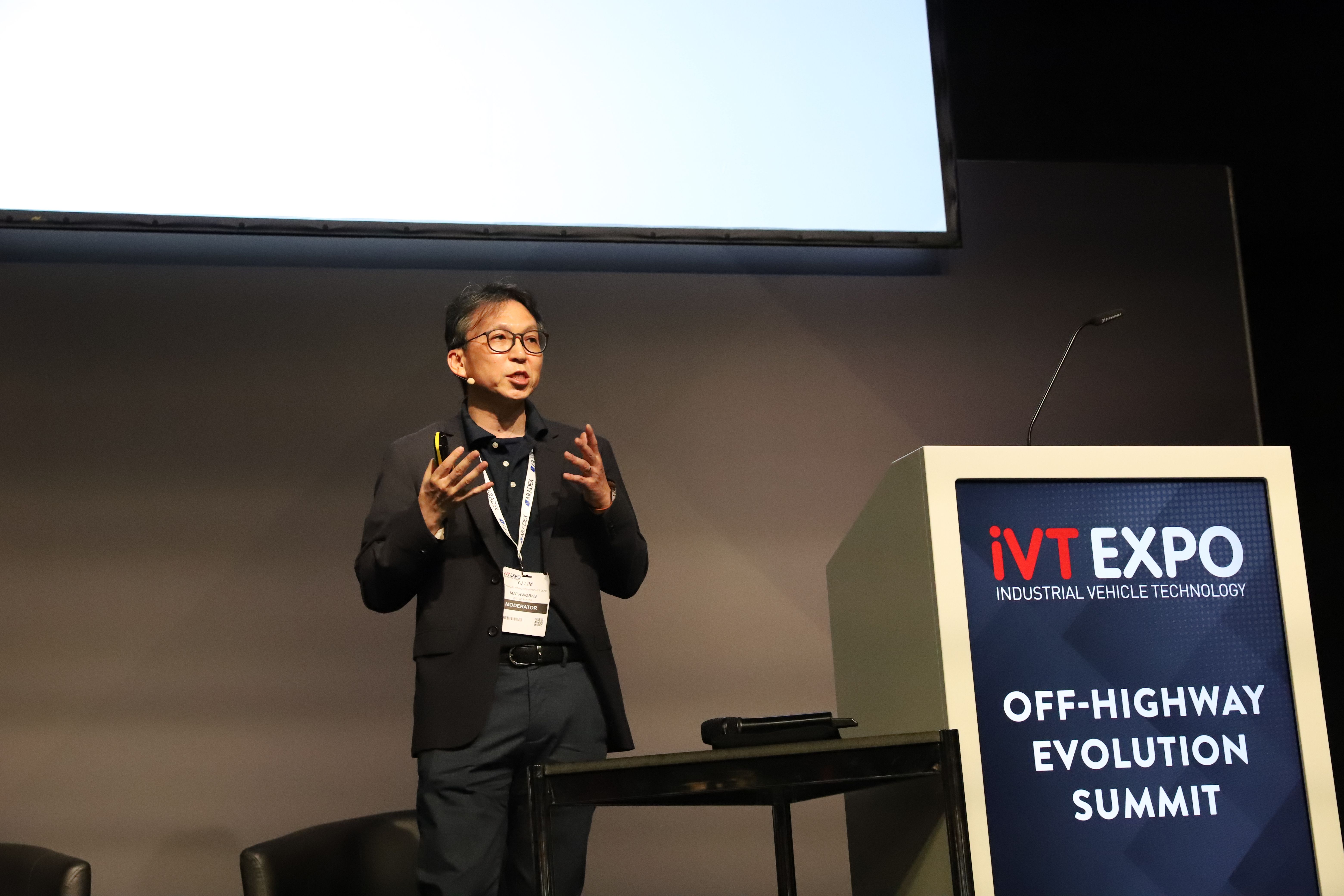 Photo shows a man presenting at the iVT Summit