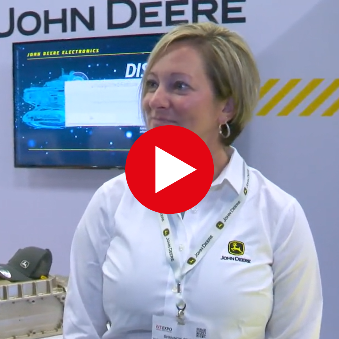 Photo shows Hannah from John Deere being interviewed at iVT Expo
