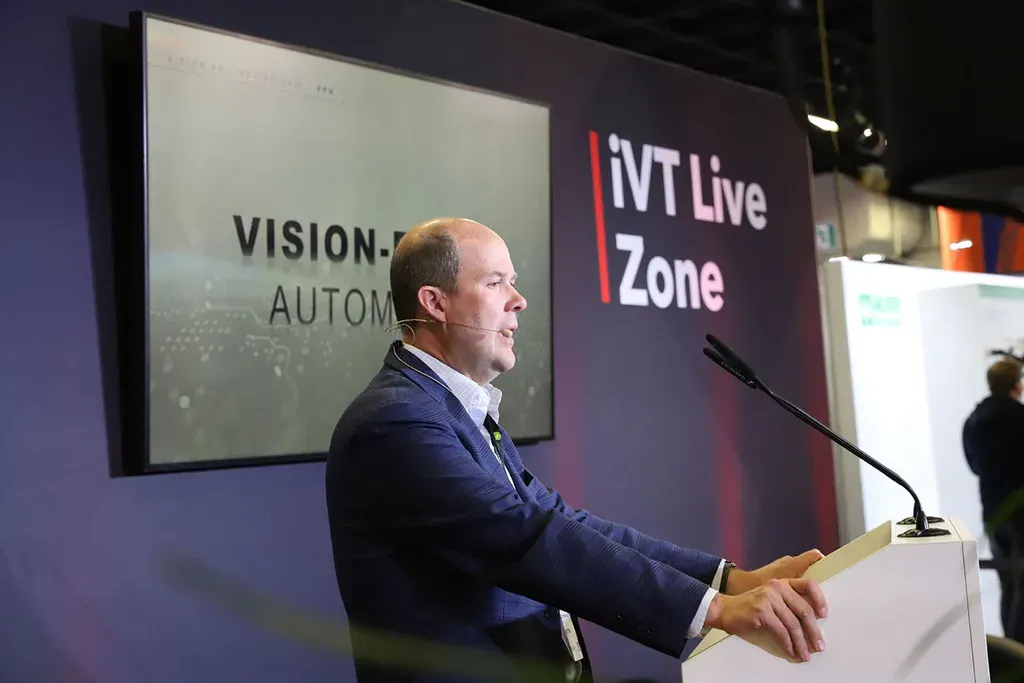Photo shows a speaker at iVT Live Zone