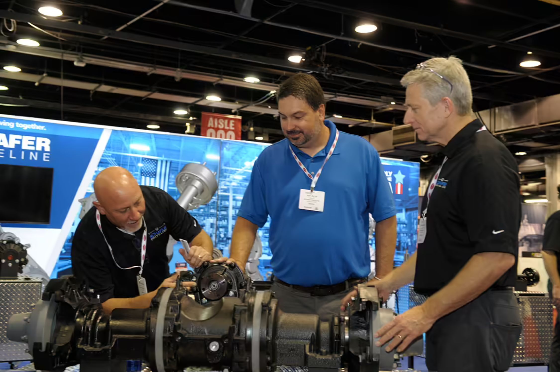 Image shows an exhibitor discussing the company's latest tech with a visitor of iVT Expo in Chicago