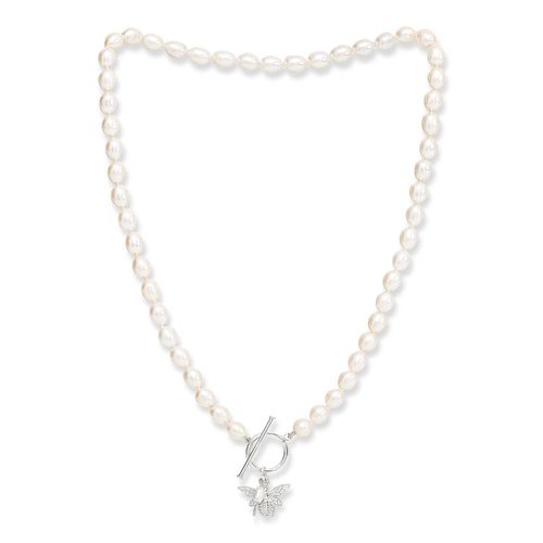 Oval white cultured freshwater pearl set with sterling silver bumble bee