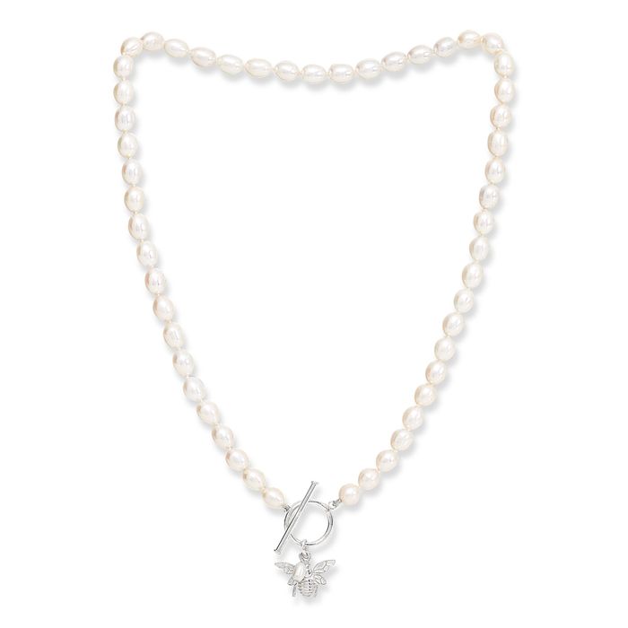 Oval white cultured freshwater pearl set with sterling silver bumble bee