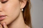 Earrings: Sterling silver pave snowflake studs with pearl drops