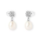 Earrings: Sterling silver pave snowflake studs with pearl drops