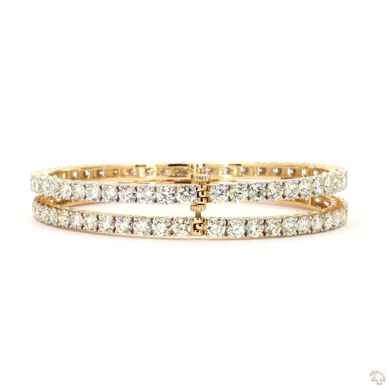 14 kt. Yellow gold - 19.37ct. tw. - Diamond - Pair of Bangles
