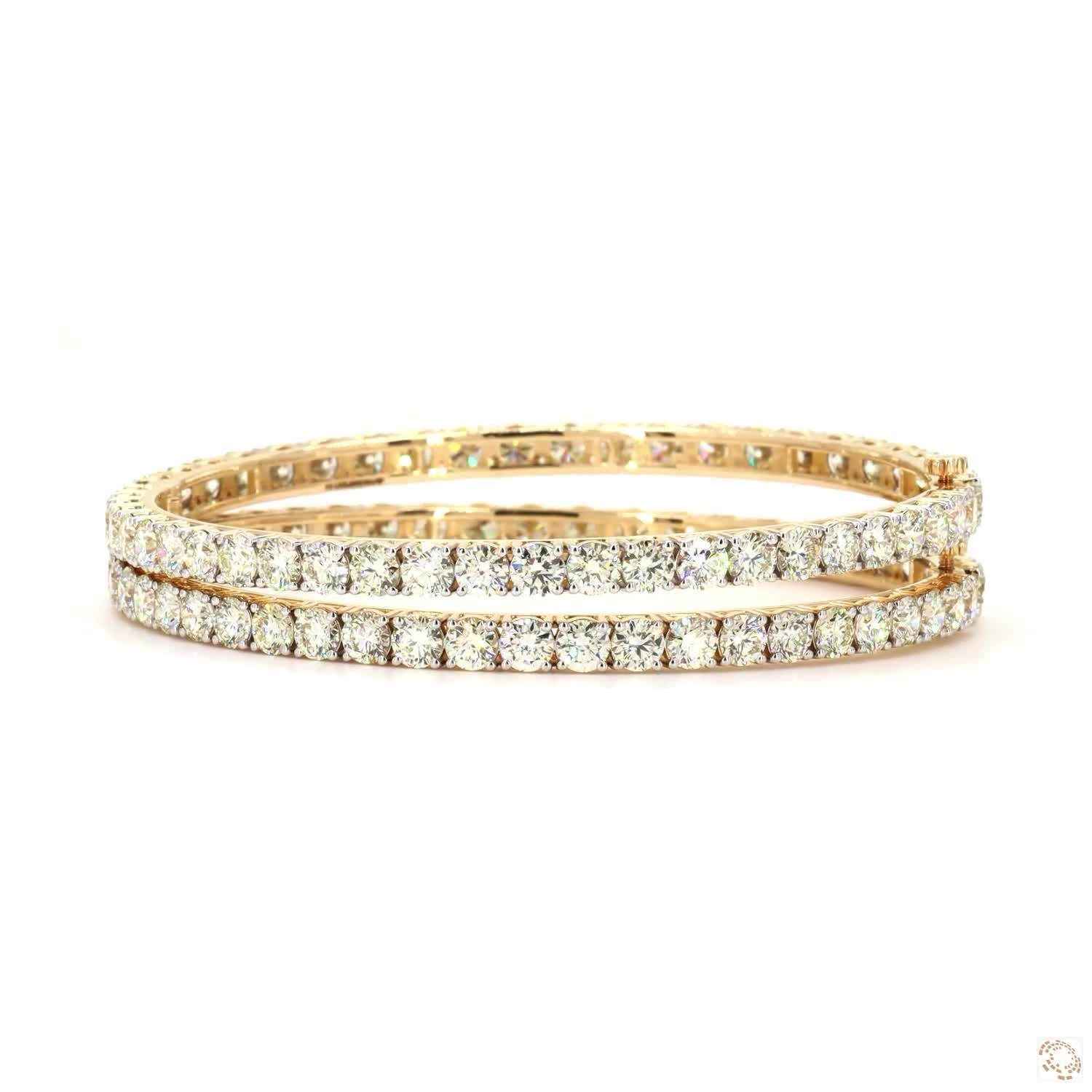 14 kt. Yellow gold - 19.37ct. tw. - Diamond - Pair of Bangles