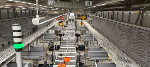 EuroSort Dual Split Tray and automated infeed at PostNL