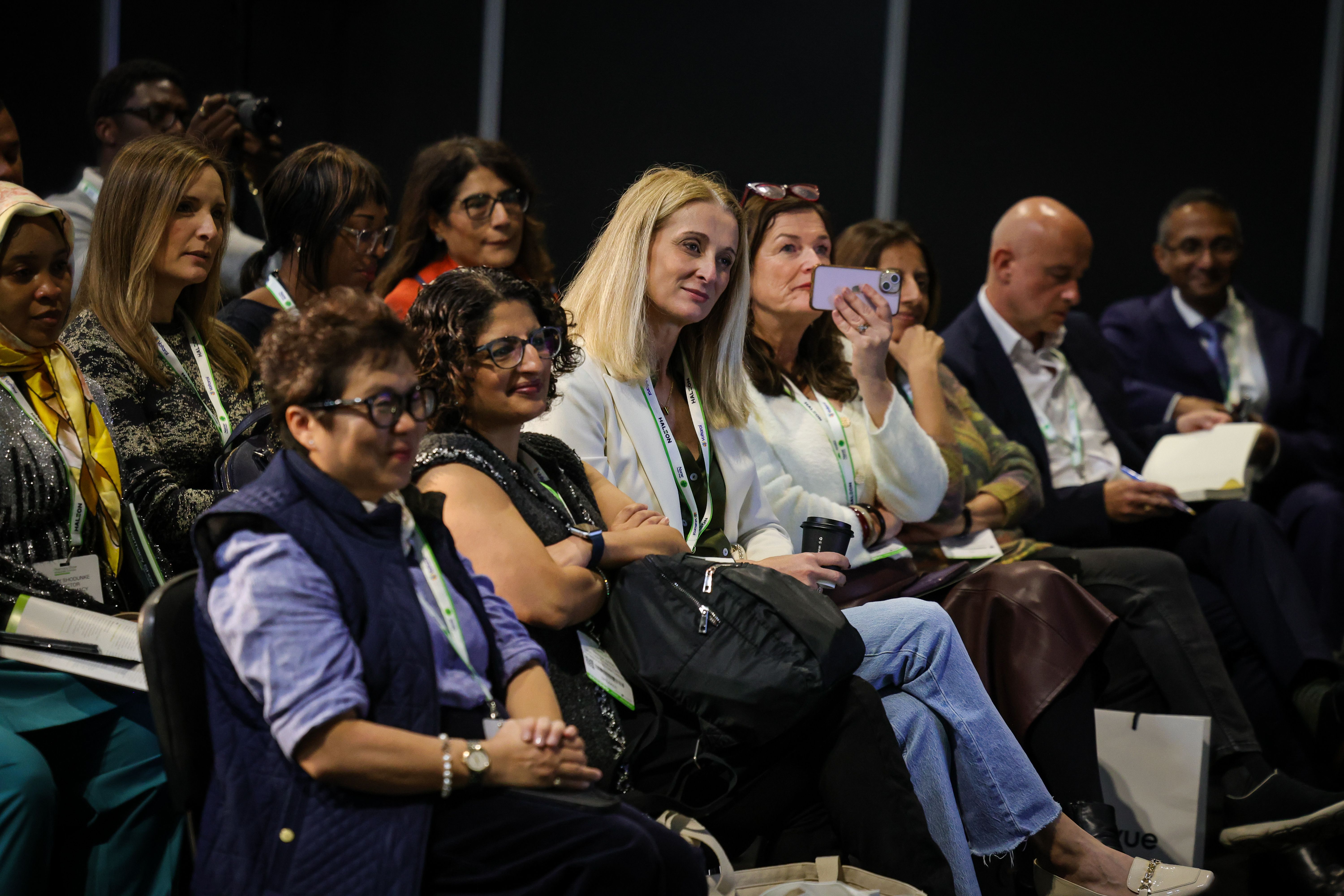 Men smiling in crowd