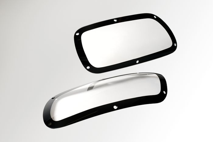 Custom polycarbonate and PMMA headlight covers for motorsport