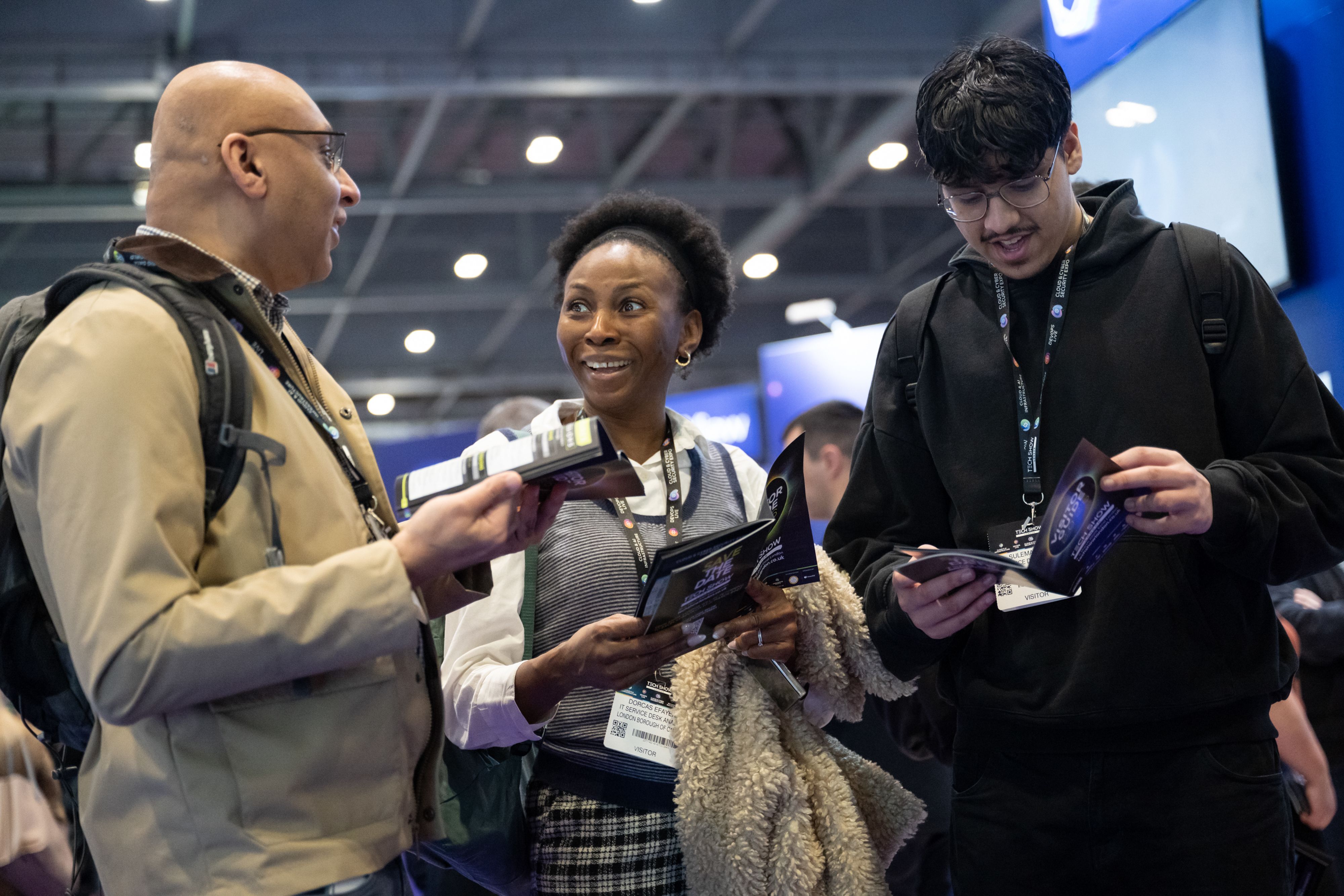 Image of People Reading Visitor Guide at TSL26
