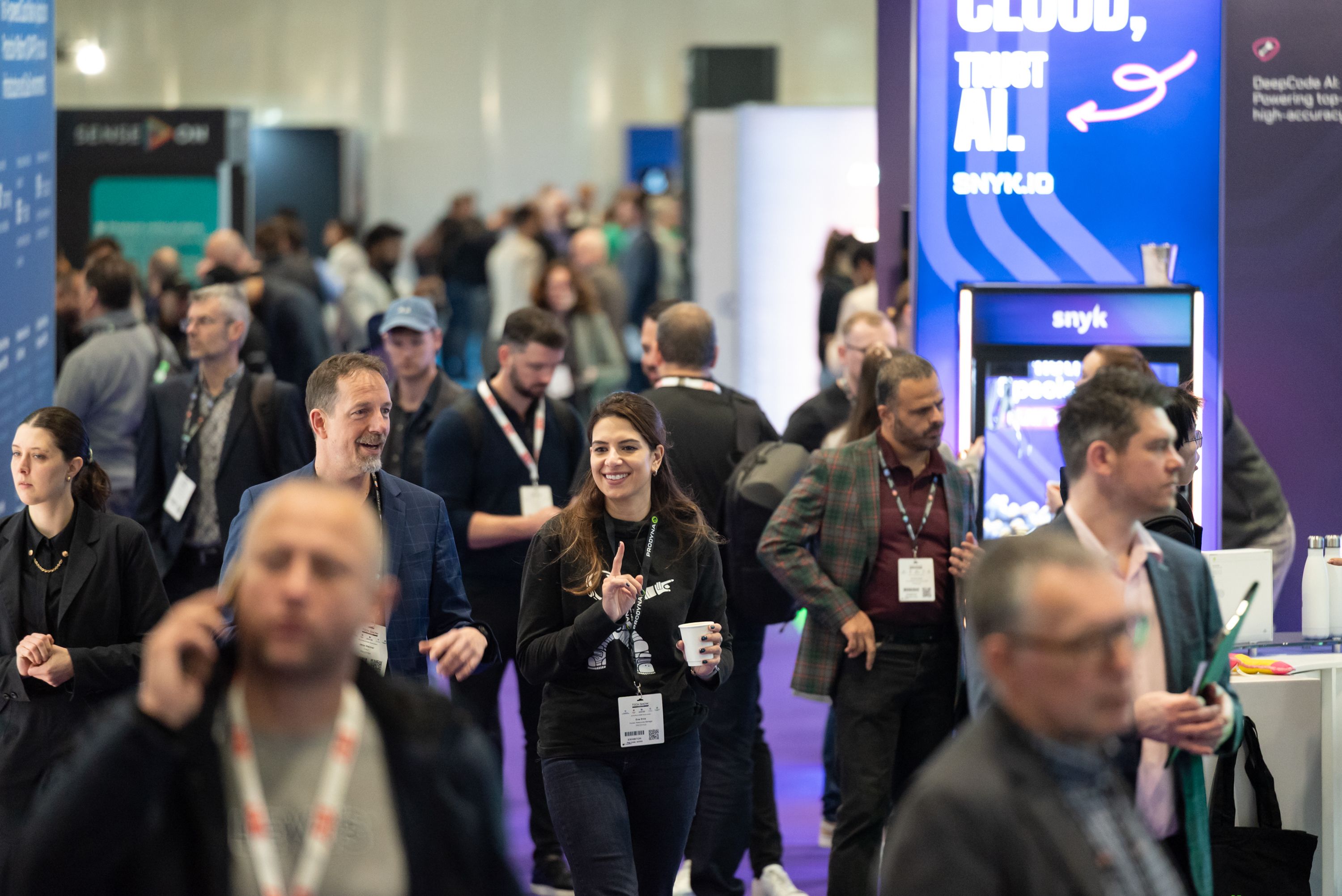Image of Busy Aisle with People Networking at TSL25