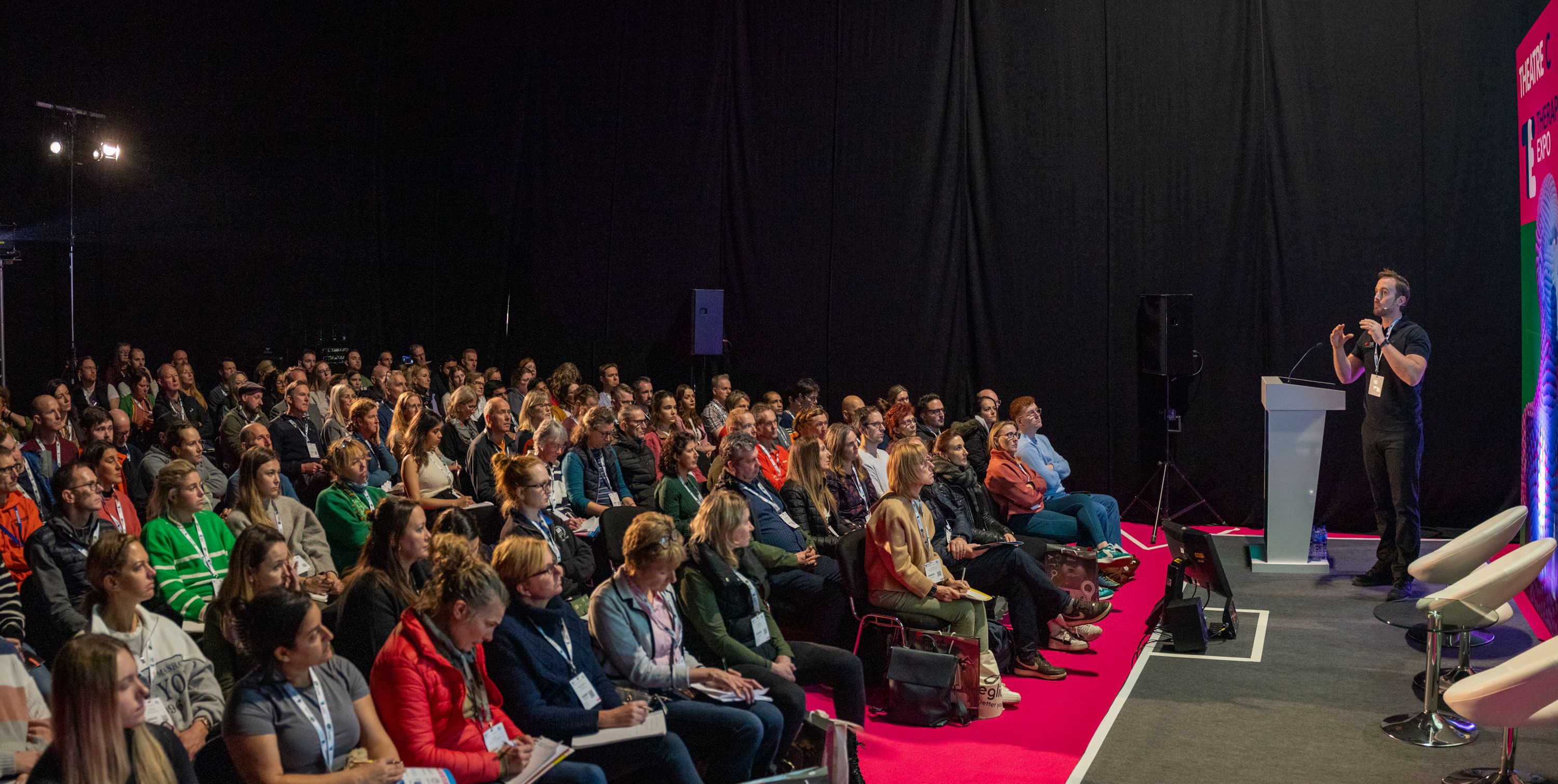 Daniel Lawrence teaching a session in a Theatre