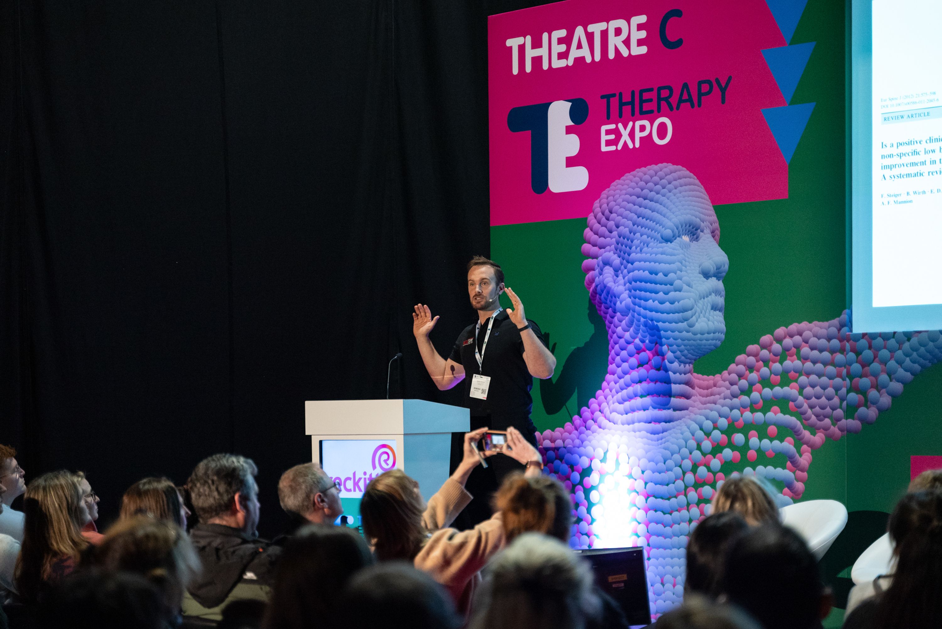 Daniel Lawrence teaching a session in a theatre 2