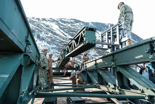 U.S. Navy Seabees join forces with the U.S. Army and Norway for bridge construction