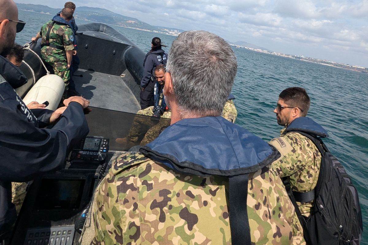 Adm Melo at the wheel of one of the fast boats