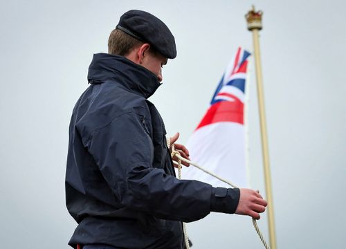 Royal Navy Plants White Ensign On Vessel Lost In World War Two