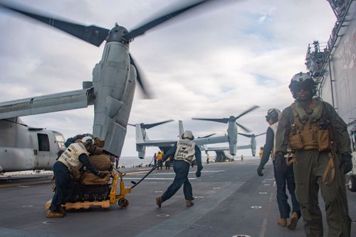 US Marines Embark On Navy Warships In Japan
