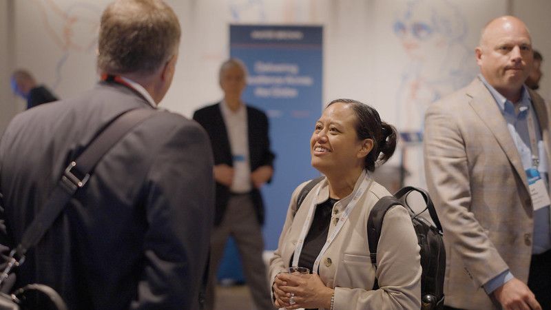 Finance industry professional networking at an event