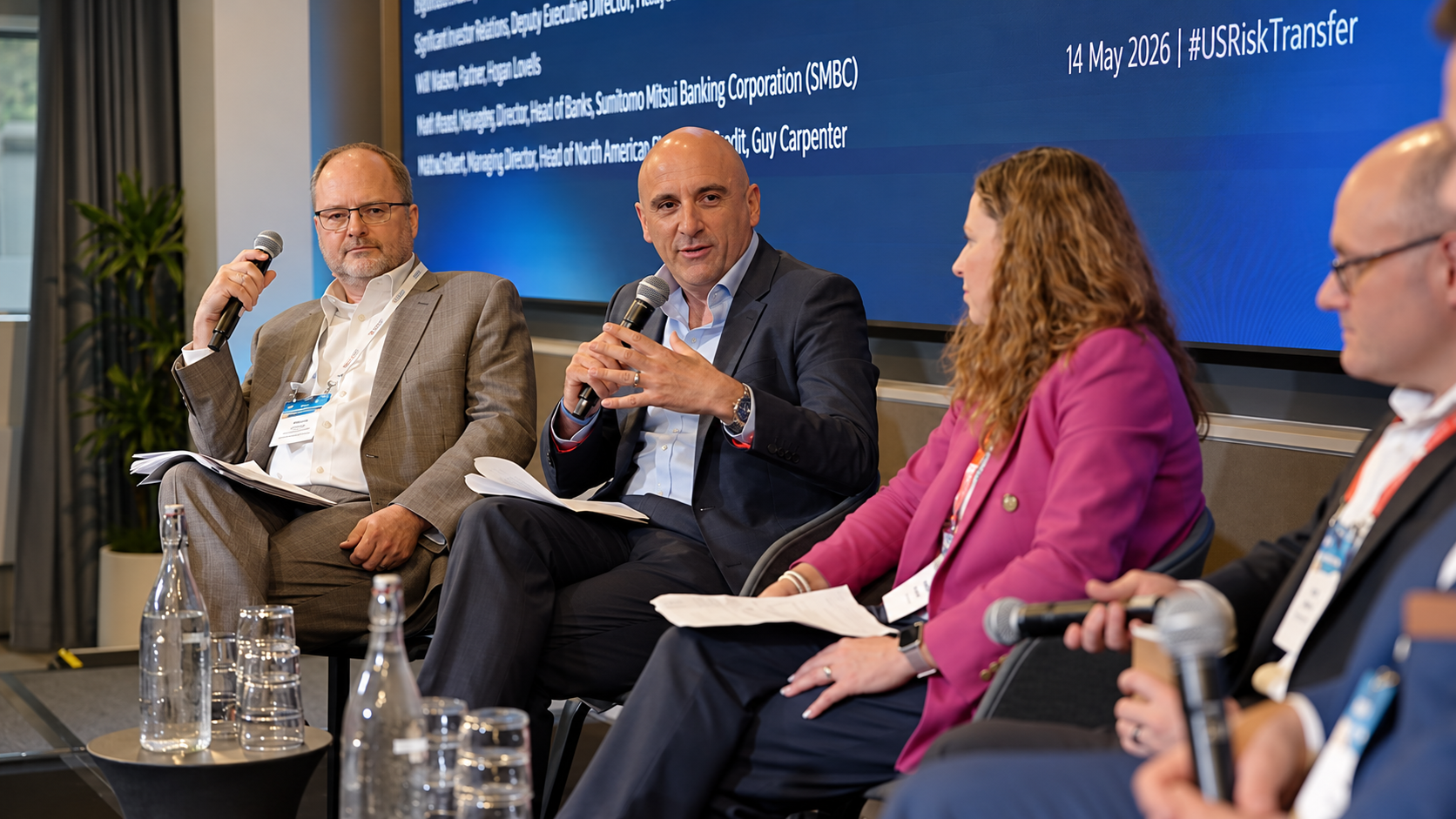 Industry experts participating in a panel discussion